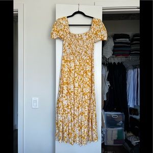 Yellow midi dress with smocked chest